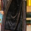 Luxurious black velvet shawl with intricate gold embellishments, perfect for elegant occasions.