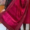 Luxurious velvet maroon shawl with gold accents and elegant design for traditional wear.
